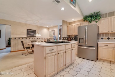 Set on 1.46 acres in Tanglwood Lakes, this 3,310-SF PRIVATE on Paupack Hills Golf and Country Club in Pennsylvania - for sale on GolfHomes.com, golf home, golf lot
