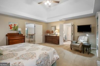 Tucked into a quiet cul-de-sac in sought-after Windward, this on The Golf Club of Georgia in Georgia - for sale on GolfHomes.com, golf home, golf lot