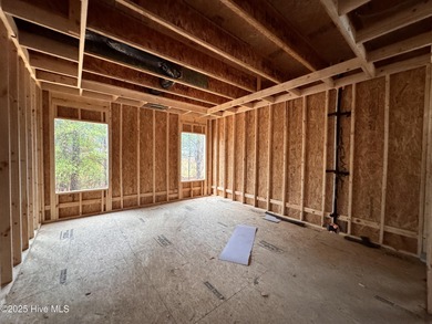 This Granville model boasts spacious great room with an electric on Legacy Golf Links in North Carolina - for sale on GolfHomes.com, golf home, golf lot