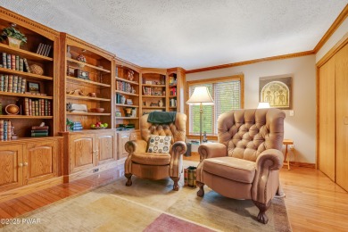 Set on 1.46 acres in Tanglwood Lakes, this 3,310-SF PRIVATE on Paupack Hills Golf and Country Club in Pennsylvania - for sale on GolfHomes.com, golf home, golf lot