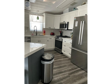 This stunning home was fully renovated in 2021 with meticulous on Lily Lake Golf and RV Resort in Florida - for sale on GolfHomes.com, golf home, golf lot
