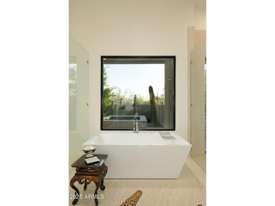 Nestled on 1.435 acres in the prestigious guard-gated community on Desert Highlands Golf Club in Arizona - for sale on GolfHomes.com, golf home, golf lot