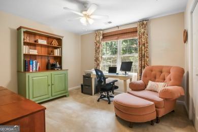 Tucked into a quiet cul-de-sac in sought-after Windward, this on The Golf Club of Georgia in Georgia - for sale on GolfHomes.com, golf home, golf lot