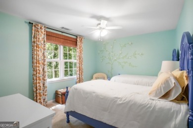 Tucked into a quiet cul-de-sac in sought-after Windward, this on The Golf Club of Georgia in Georgia - for sale on GolfHomes.com, golf home, golf lot