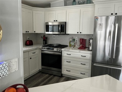 This stunning home was fully renovated in 2021 with meticulous on Lily Lake Golf and RV Resort in Florida - for sale on GolfHomes.com, golf home, golf lot