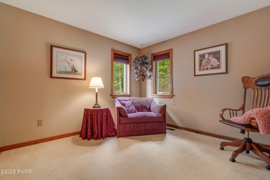 Set on 1.46 acres in Tanglwood Lakes, this 3,310-SF PRIVATE on Paupack Hills Golf and Country Club in Pennsylvania - for sale on GolfHomes.com, golf home, golf lot