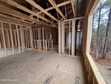 This Granville model boasts spacious great room with an electric on Legacy Golf Links in North Carolina - for sale on GolfHomes.com, golf home, golf lot