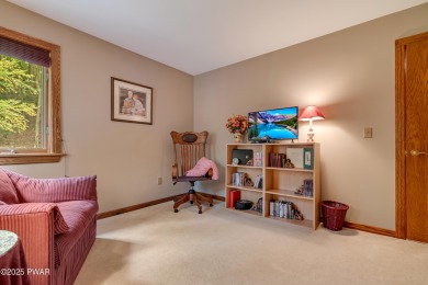 Set on 1.46 acres in Tanglwood Lakes, this 3,310-SF PRIVATE on Paupack Hills Golf and Country Club in Pennsylvania - for sale on GolfHomes.com, golf home, golf lot