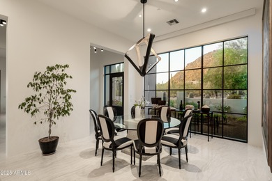 Nestled on 1.435 acres in the prestigious guard-gated community on Desert Highlands Golf Club in Arizona - for sale on GolfHomes.com, golf home, golf lot