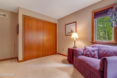 Set on 1.46 acres in Tanglwood Lakes, this 3,310-SF PRIVATE on Paupack Hills Golf and Country Club in Pennsylvania - for sale on GolfHomes.com, golf home, golf lot