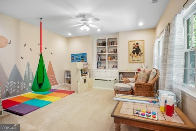 Tucked into a quiet cul-de-sac in sought-after Windward, this on The Golf Club of Georgia in Georgia - for sale on GolfHomes.com, golf home, golf lot