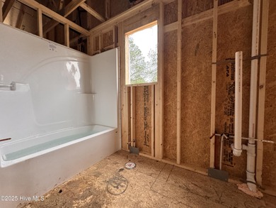 This Granville model boasts spacious great room with an electric on Legacy Golf Links in North Carolina - for sale on GolfHomes.com, golf home, golf lot