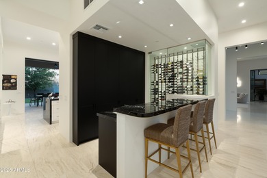 Nestled on 1.435 acres in the prestigious guard-gated community on Desert Highlands Golf Club in Arizona - for sale on GolfHomes.com, golf home, golf lot