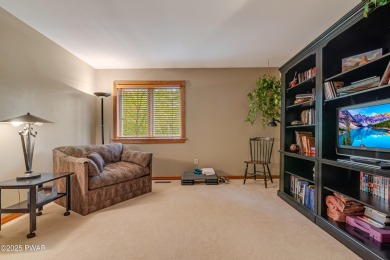 Set on 1.46 acres in Tanglwood Lakes, this 3,310-SF PRIVATE on Paupack Hills Golf and Country Club in Pennsylvania - for sale on GolfHomes.com, golf home, golf lot