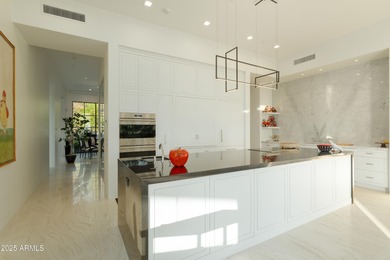 Nestled on 1.435 acres in the prestigious guard-gated community on Desert Highlands Golf Club in Arizona - for sale on GolfHomes.com, golf home, golf lot