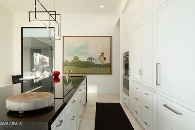 Nestled on 1.435 acres in the prestigious guard-gated community on Desert Highlands Golf Club in Arizona - for sale on GolfHomes.com, golf home, golf lot