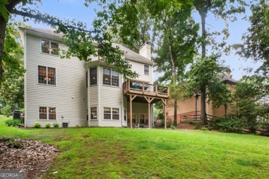 Tucked into a quiet cul-de-sac in sought-after Windward, this on The Golf Club of Georgia in Georgia - for sale on GolfHomes.com, golf home, golf lot