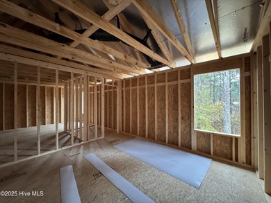 This Granville model boasts spacious great room with an electric on Legacy Golf Links in North Carolina - for sale on GolfHomes.com, golf home, golf lot