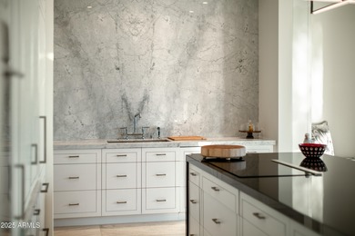 Nestled on 1.435 acres in the prestigious guard-gated community on Desert Highlands Golf Club in Arizona - for sale on GolfHomes.com, golf home, golf lot