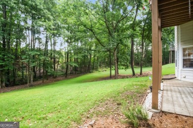 Tucked into a quiet cul-de-sac in sought-after Windward, this on The Golf Club of Georgia in Georgia - for sale on GolfHomes.com, golf home, golf lot