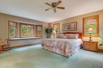 Set on 1.46 acres in Tanglwood Lakes, this 3,310-SF PRIVATE on Paupack Hills Golf and Country Club in Pennsylvania - for sale on GolfHomes.com, golf home, golf lot