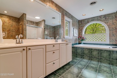 Set on 1.46 acres in Tanglwood Lakes, this 3,310-SF PRIVATE on Paupack Hills Golf and Country Club in Pennsylvania - for sale on GolfHomes.com, golf home, golf lot