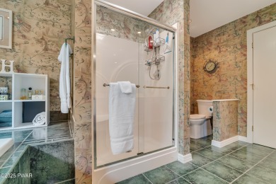 Set on 1.46 acres in Tanglwood Lakes, this 3,310-SF PRIVATE on Paupack Hills Golf and Country Club in Pennsylvania - for sale on GolfHomes.com, golf home, golf lot