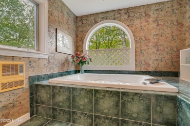 Set on 1.46 acres in Tanglwood Lakes, this 3,310-SF PRIVATE on Paupack Hills Golf and Country Club in Pennsylvania - for sale on GolfHomes.com, golf home, golf lot