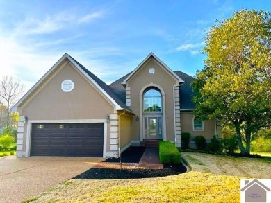 Gorgeous home adjoining the Murray Country Club overlooking Hole on Murray Golf Course, Inc in Kentucky - for sale on GolfHomes.com, golf home, golf lot