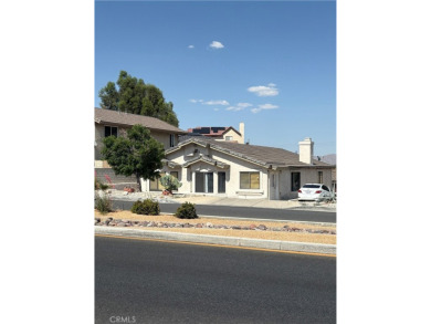 Welcome to 12411 Spring Valley Parkway, located in the highly on Spring Valley Lake Country Club in California - for sale on GolfHomes.com, golf home, golf lot