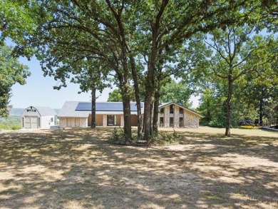 Lovely home with a mountaintop view overlooking Keystone Lake on Keystone Golf Club in Oklahoma - for sale on GolfHomes.com, golf home, golf lot