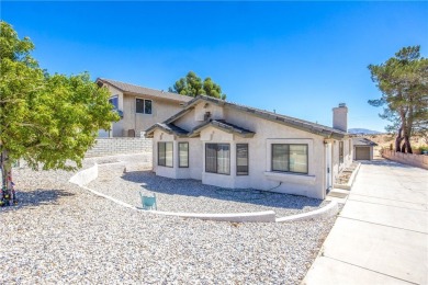 Welcome to 12411 Spring Valley Parkway, located in the highly on Spring Valley Lake Country Club in California - for sale on GolfHomes.com, golf home, golf lot