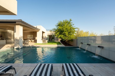 Nestled on 1.435 acres in the prestigious guard-gated community on Desert Highlands Golf Club in Arizona - for sale on GolfHomes.com, golf home, golf lot