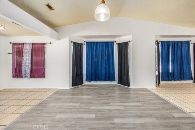 Welcome to 12411 Spring Valley Parkway, located in the highly on Spring Valley Lake Country Club in California - for sale on GolfHomes.com, golf home, golf lot