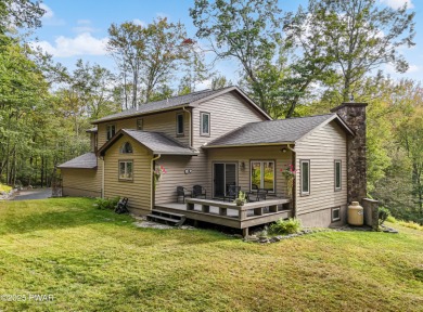 Set on 1.46 acres in Tanglwood Lakes, this 3,310-SF PRIVATE on Paupack Hills Golf and Country Club in Pennsylvania - for sale on GolfHomes.com, golf home, golf lot