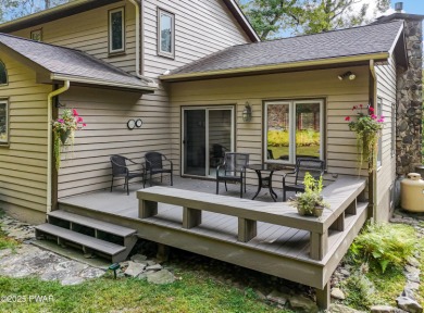 Set on 1.46 acres in Tanglwood Lakes, this 3,310-SF PRIVATE on Paupack Hills Golf and Country Club in Pennsylvania - for sale on GolfHomes.com, golf home, golf lot