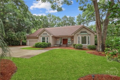 This beautifully updated home in The Landings offers privacy on The Landings Club - Palmetto in Georgia - for sale on GolfHomes.com, golf home, golf lot