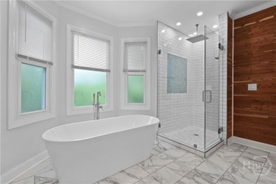 This beautifully updated home in The Landings offers privacy on The Landings Club - Palmetto in Georgia - for sale on GolfHomes.com, golf home, golf lot