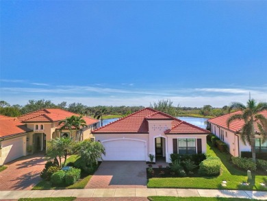 Elegant Key Largo Model in Sarasota National Lake Community - A on Sarasota National Golf Club in Florida - for sale on GolfHomes.com, golf home, golf lot