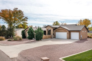 Right on golf course!  You'll LOVE the location and quality of on Desert Hawk At Pueblo West in Colorado - for sale on GolfHomes.com, golf home, golf lot