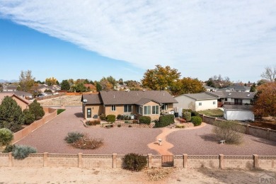 Right on golf course!  You'll LOVE the location and quality of on Desert Hawk At Pueblo West in Colorado - for sale on GolfHomes.com, golf home, golf lot