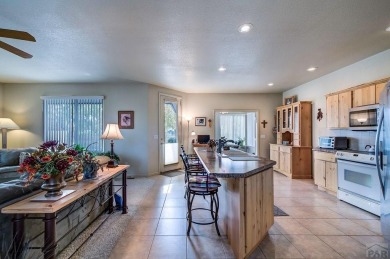 Right on golf course!  You'll LOVE the location and quality of on Desert Hawk At Pueblo West in Colorado - for sale on GolfHomes.com, golf home, golf lot