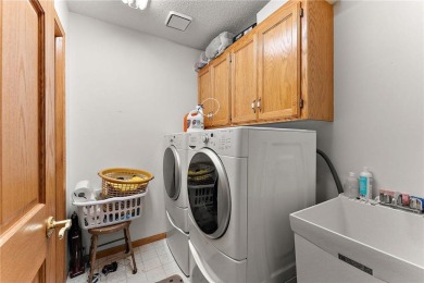 The spacious kitchen is ideal for entertaining, and a cozy gas on Edinburgh USA in Minnesota - for sale on GolfHomes.com, golf home, golf lot