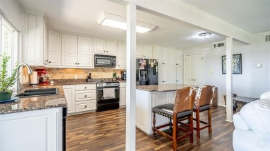 Nicely updated townhome in a private, gated community. Fabulous on De Cordova Bend Country Club in Texas - for sale on GolfHomes.com, golf home, golf lot