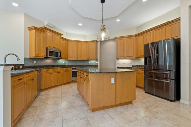One or more photo(s) has been virtually staged. Luxury Living in on Crescent Oaks Country Club in Florida - for sale on GolfHomes.com, golf home, golf lot