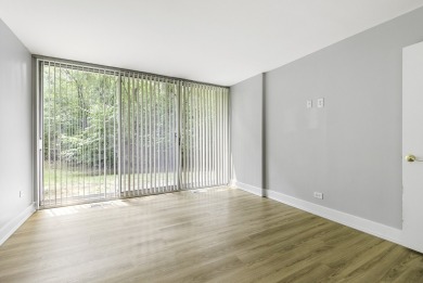 Welcome to this fabulous first-floor end-unit condo-Four Lakes' on River Bend Golf Club in Illinois - for sale on GolfHomes.com, golf home, golf lot