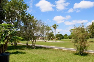 Nestled in Sunrise within the picturesque Fairway Club community on Springtree Country Club in Florida - for sale on GolfHomes.com, golf home, golf lot