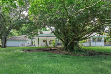 Welcome to Plantation! Behind the gates of Coco Plum Estates and on Jacaranda Golf Club in Florida - for sale on GolfHomes.com, golf home, golf lot