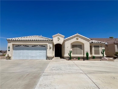 Situated gracefully between the 11th and 12th holes of the on Desert Lakes Golf Course in Arizona - for sale on GolfHomes.com, golf home, golf lot
