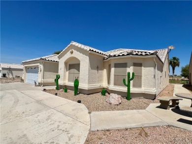 Situated gracefully between the 11th and 12th holes of the on Desert Lakes Golf Course in Arizona - for sale on GolfHomes.com, golf home, golf lot